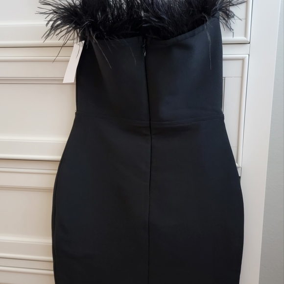 Black cocktail dress with feathers - Picture 5 of 6